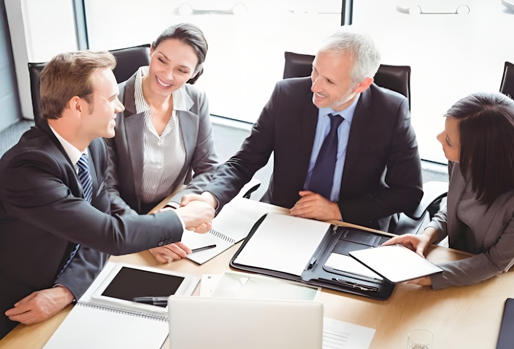Business professionals building relationships illustrating B2B brand memory building through trust and engagement